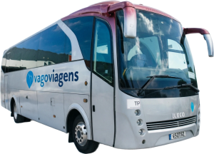 White tour bus with a blue Vagoviagens logo on its side, parked outdoors